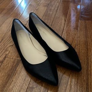 Black snake skin pointed toe flats